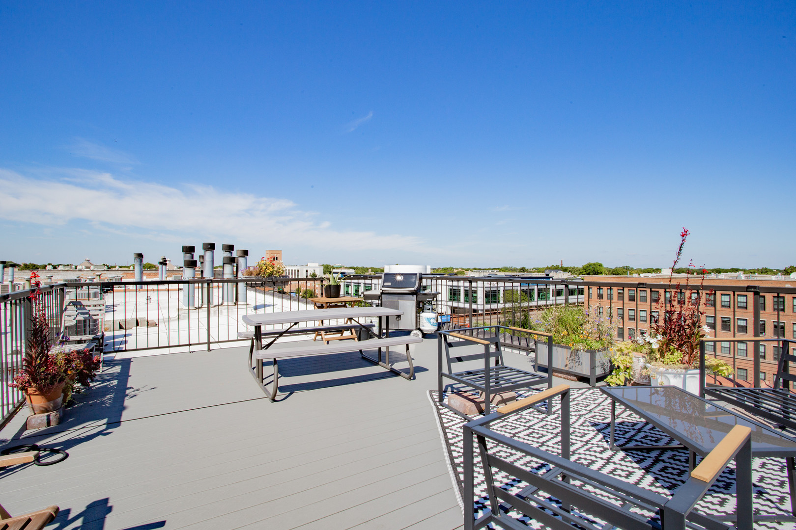 4745 North Ravenswood Avenue, Unit 210 Chicago, IL 60640 - Photo 20 of 23 a view of a balcony with chairs