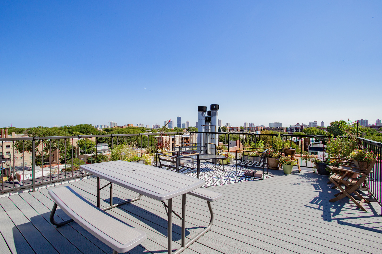 4745 North Ravenswood Avenue, Unit 210 Chicago, IL 60640 - Photo 21 of 23 a view of a terrace with seating area