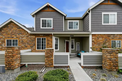 a front view of a house with a garage