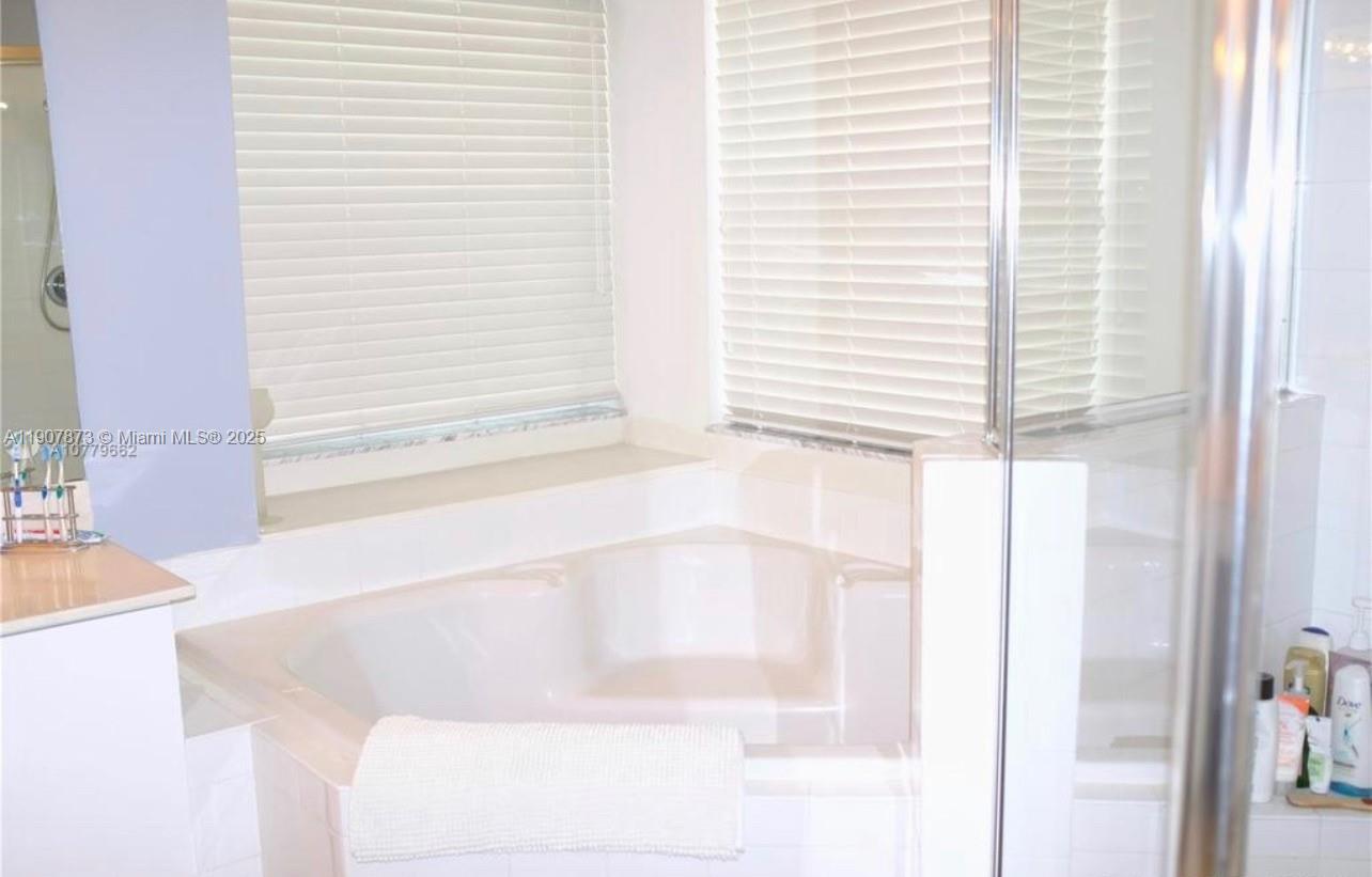 3341 Overlook Road Davie, FL 33328 - Photo 23 of 30 a close up of a bathtub