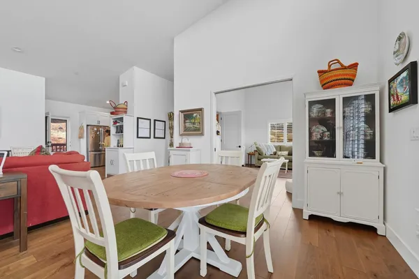 a living room with furniture and white walls