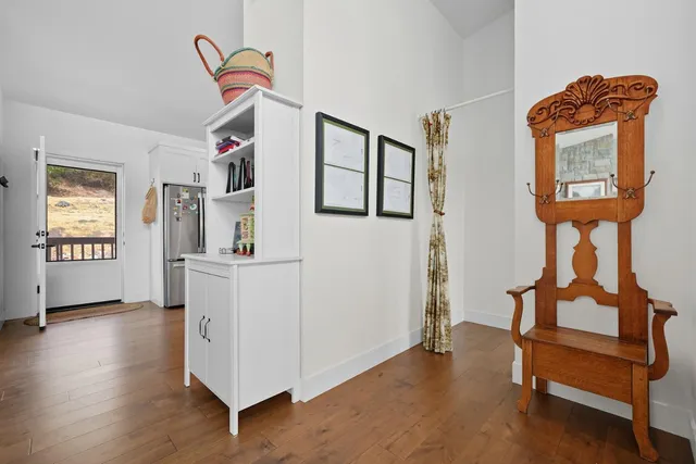 a bedroom with a bunk bed and a dresser