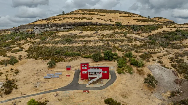 a kitchen with stainless steel appliances granite countertop white cabinets sink and dishwasher