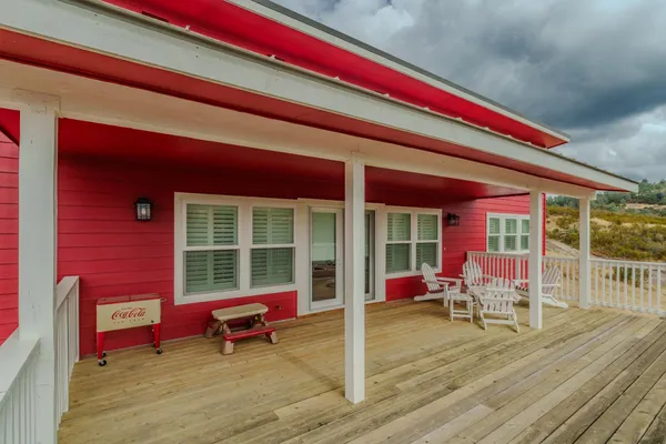 a kitchen with kitchen island granite countertop lots of counter top space and sink