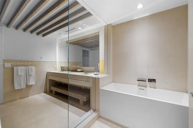 a view of bathroom with dual sinks