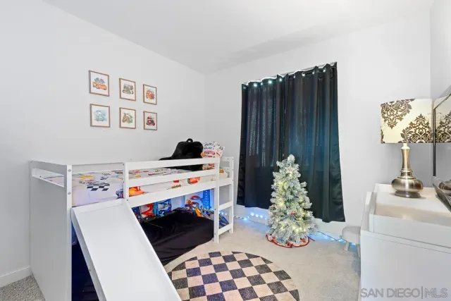 a utility room with sink dryer and washer