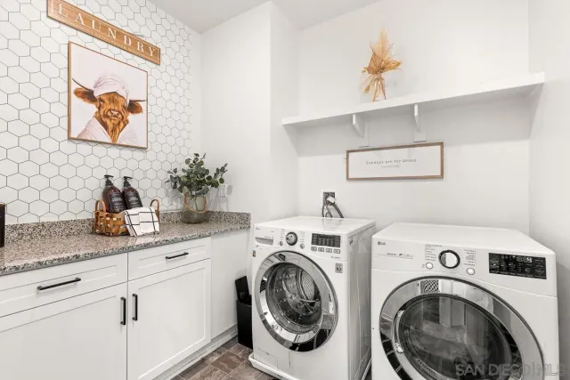 a view of a house with swimming pool and mountains in the background