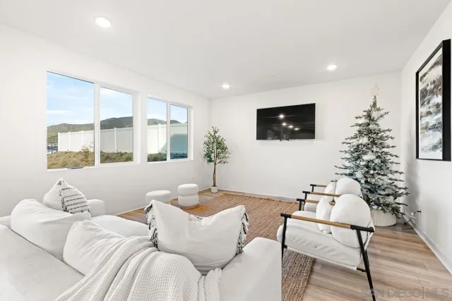 a living room with furniture and a table