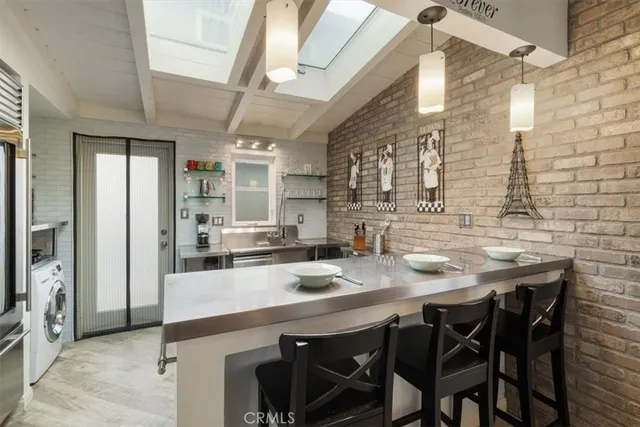 a kitchen with a stove and a sink