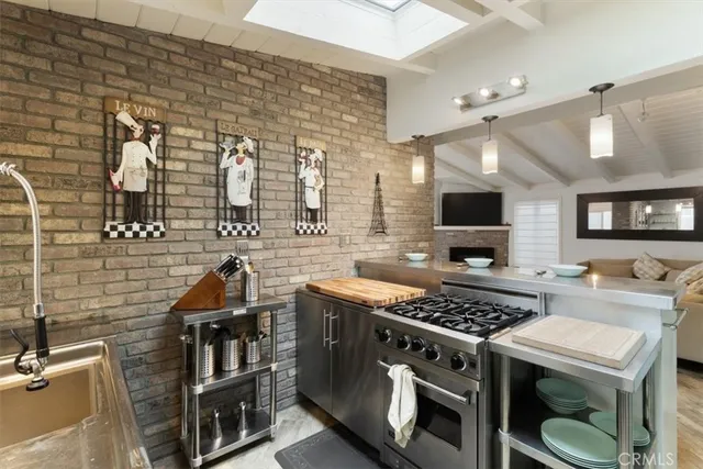 a view of a bathroom with a sink and mirror