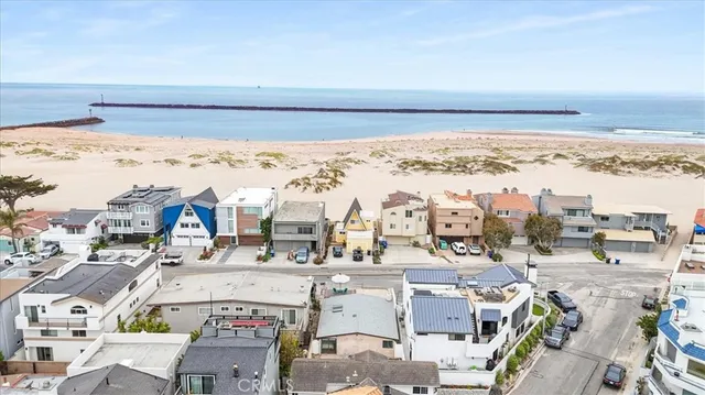 an aerial view of beach and city