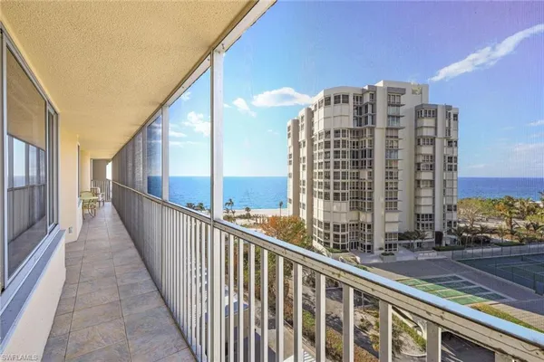a view of a balcony with city view
