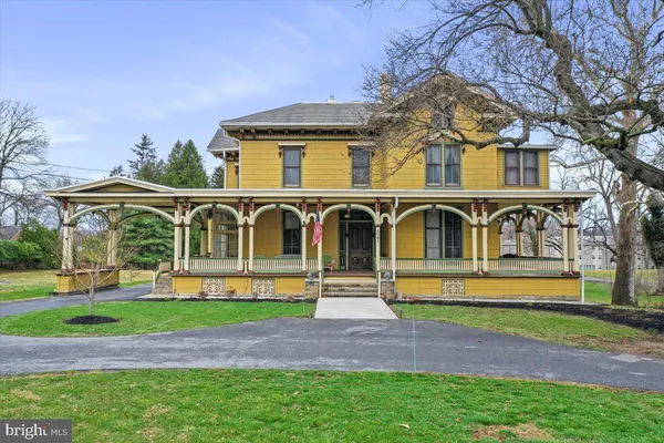 a front view of house with a yard