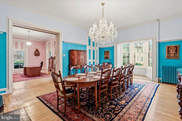 a white toilet sitting next to a bathroom sink