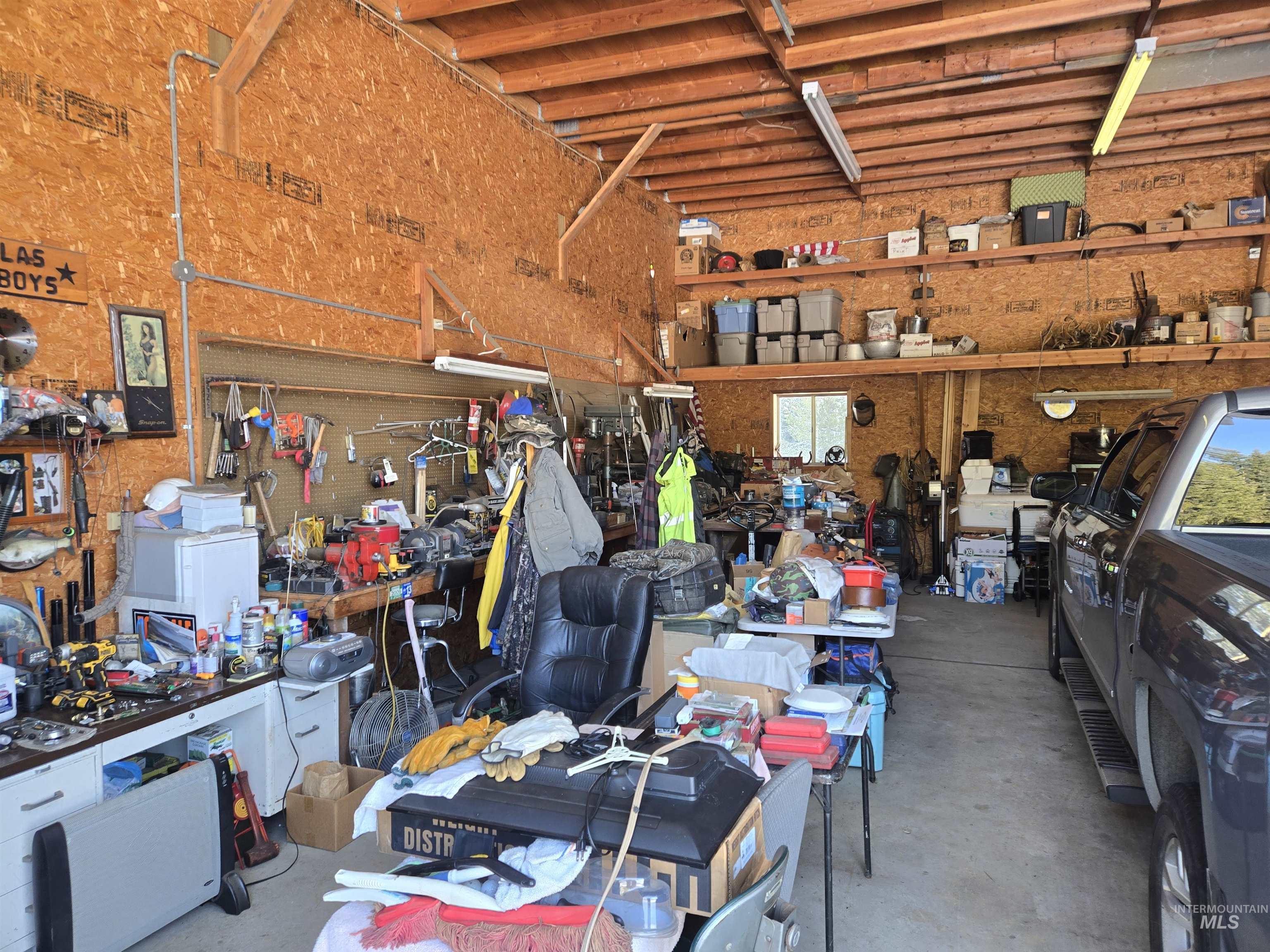 254 Lackey Road Weippe, ID 83553 - Photo 25 of 38 Garage with a workshop area