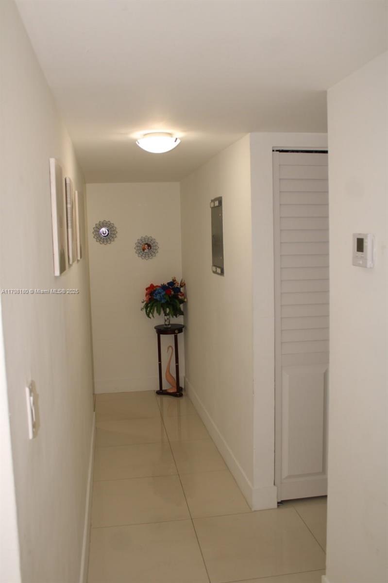 1221 Southwest 122nd Avenue, Unit 401 Miami, FL 33184 - Photo 11 of 22 a view of an empty room