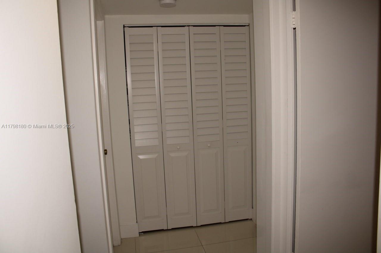 1221 Southwest 122nd Avenue, Unit 401 Miami, FL 33184 - Photo 18 of 22 a view of front door