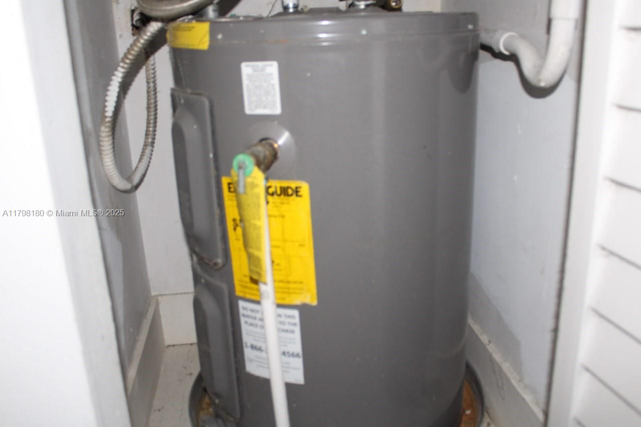 1221 Southwest 122nd Avenue, Unit 401 Miami, FL 33184 - Photo 21 of 22 a view of a bathroom with a sink