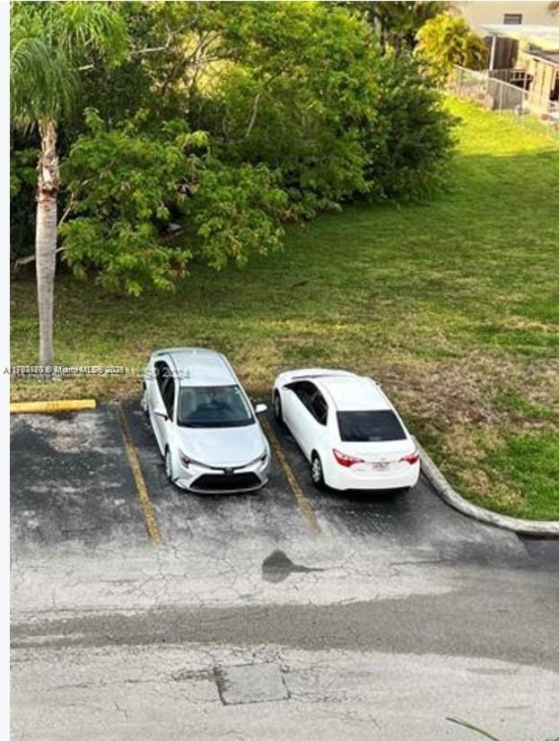 1221 Southwest 122nd Avenue, Unit 401 Miami, FL 33184 - Photo 22 of 22 a view of outdoor space with lake view