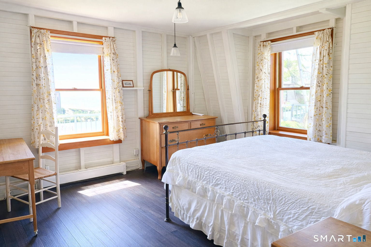 106 Buffalo Bay Road Madison, CT 06443 - Photo 13 of 17 a bedroom with a bed and a window