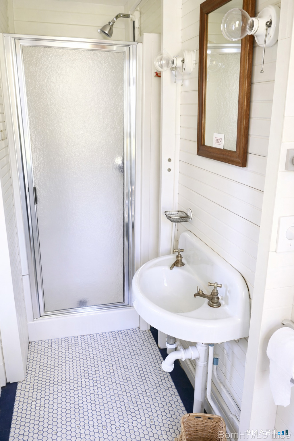 106 Buffalo Bay Road Madison, CT 06443 - Photo 17 of 17 a bathroom with a sink a toilet and shower