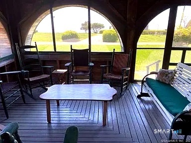 106 Buffalo Bay Road Madison, CT 06443 - Photo 5 of 17 a view of a living room with furniture and wooden floor