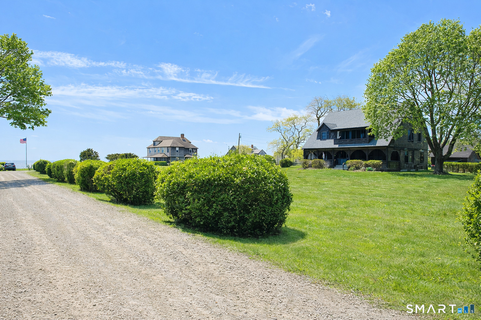 106 Buffalo Bay Road Madison, CT 06443 - Photo 6 of 17 a backyard of a house with lots of green space