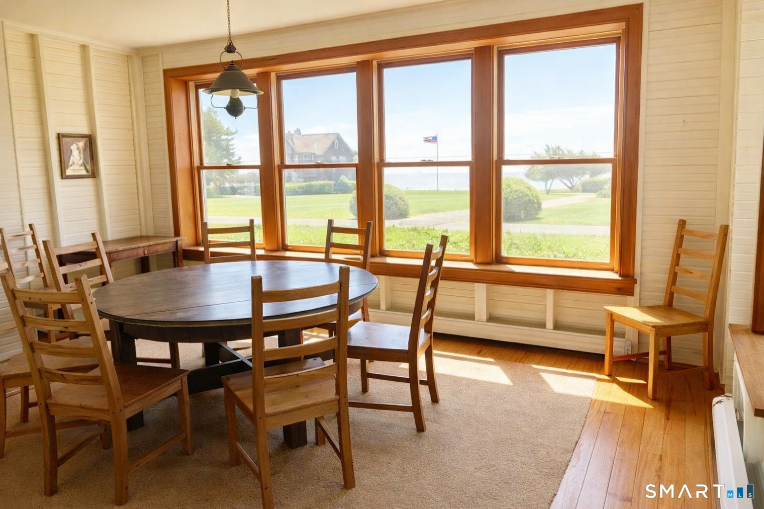 106 Buffalo Bay Road Madison, CT 06443 - Photo 10 of 17 a dining room with furniture and window