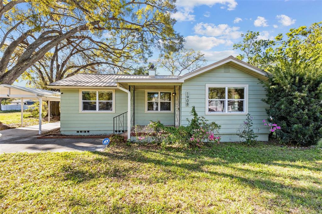 a view of a house with a patio