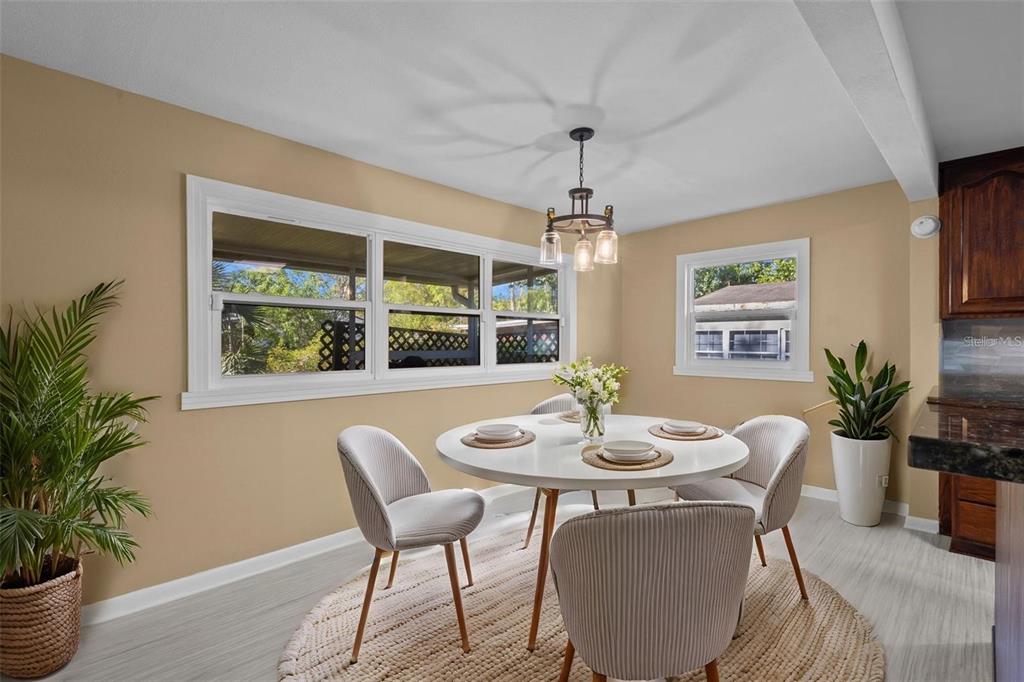 1908 West Fern Street Tampa, FL 33604 - Photo 11 of 47 a view of a dining room with furniture window and wooden floor