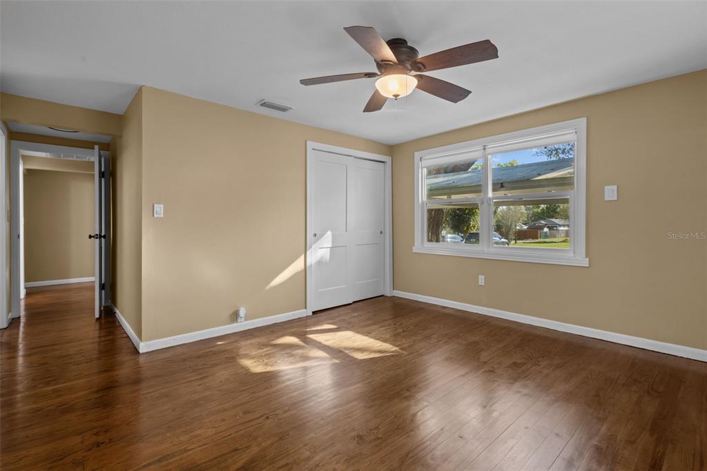 1908 West Fern Street Tampa, FL 33604 - Photo 16 of 47 an empty room with wooden floor and windows