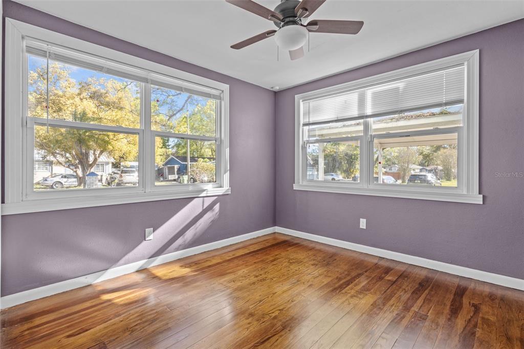 1908 West Fern Street Tampa, FL 33604 - Photo 20 of 47 a view of an empty room with a window and wooden floor