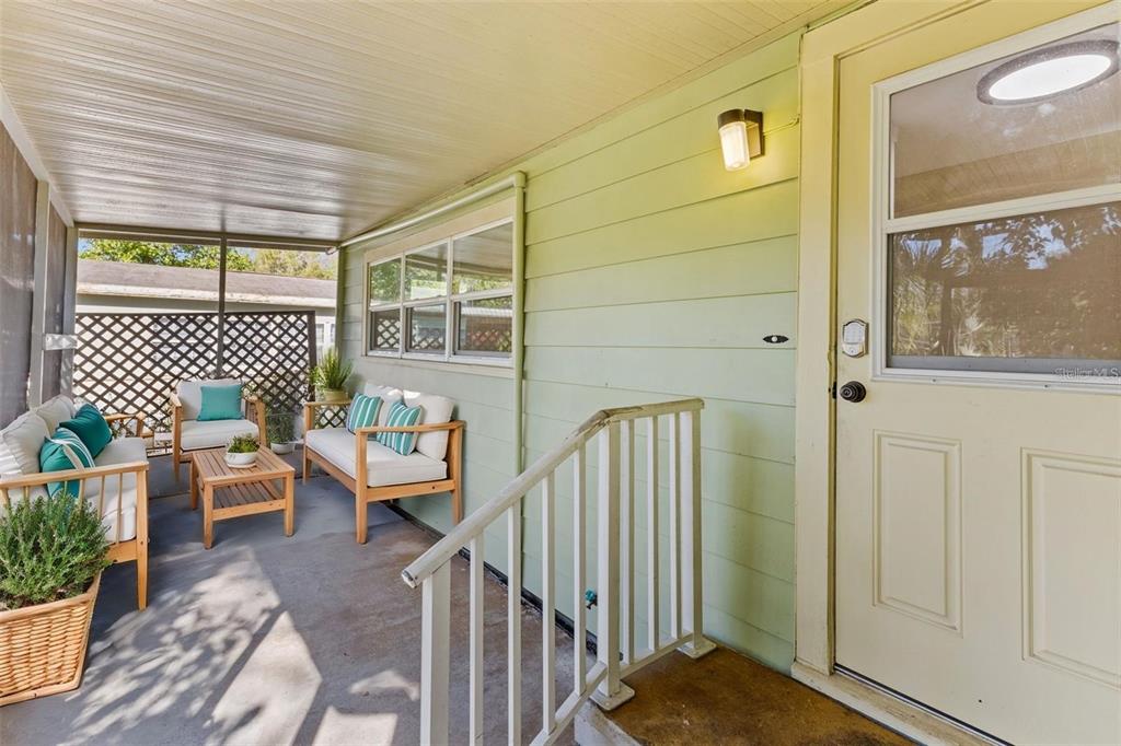 1908 West Fern Street Tampa, FL 33604 - Photo 26 of 47 a balcony with furniture and wooden floor
