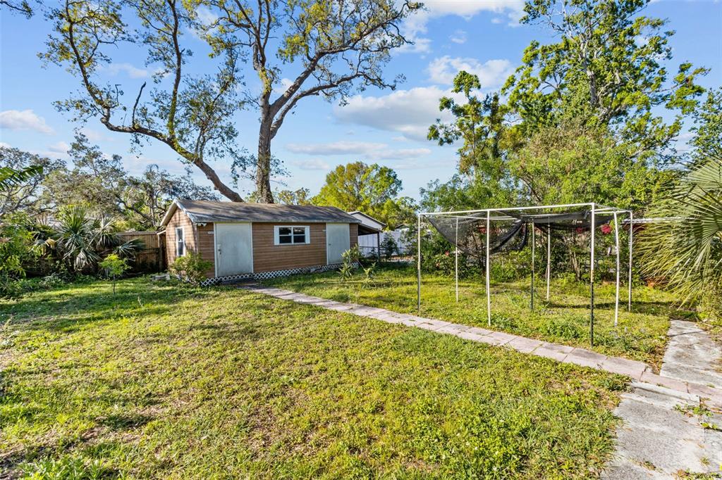 1908 West Fern Street Tampa, FL 33604 - Photo 29 of 47 a view of a house with a yard and sitting area