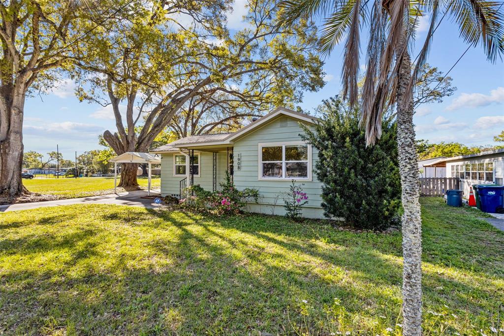1908 West Fern Street Tampa, FL 33604 - Photo 35 of 47 a view of a house with a yard patio and swimming pool