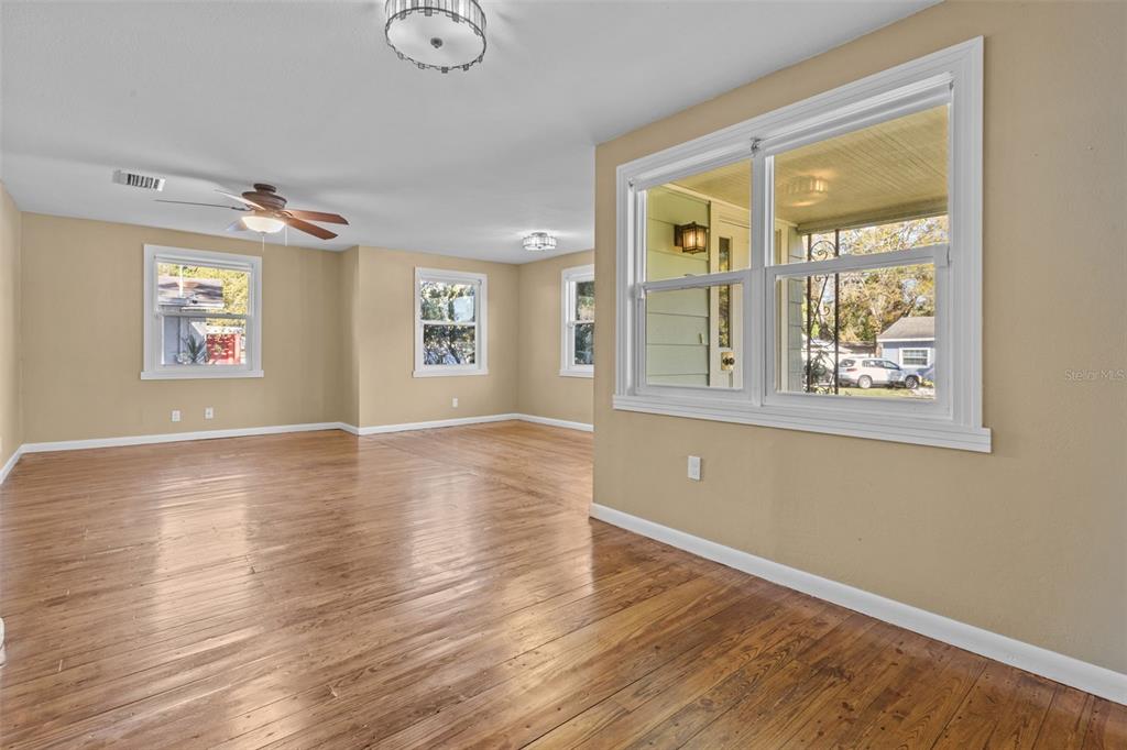 1908 West Fern Street Tampa, FL 33604 - Photo 6 of 47 a view of livingroom with furniture wooden floor and windows
