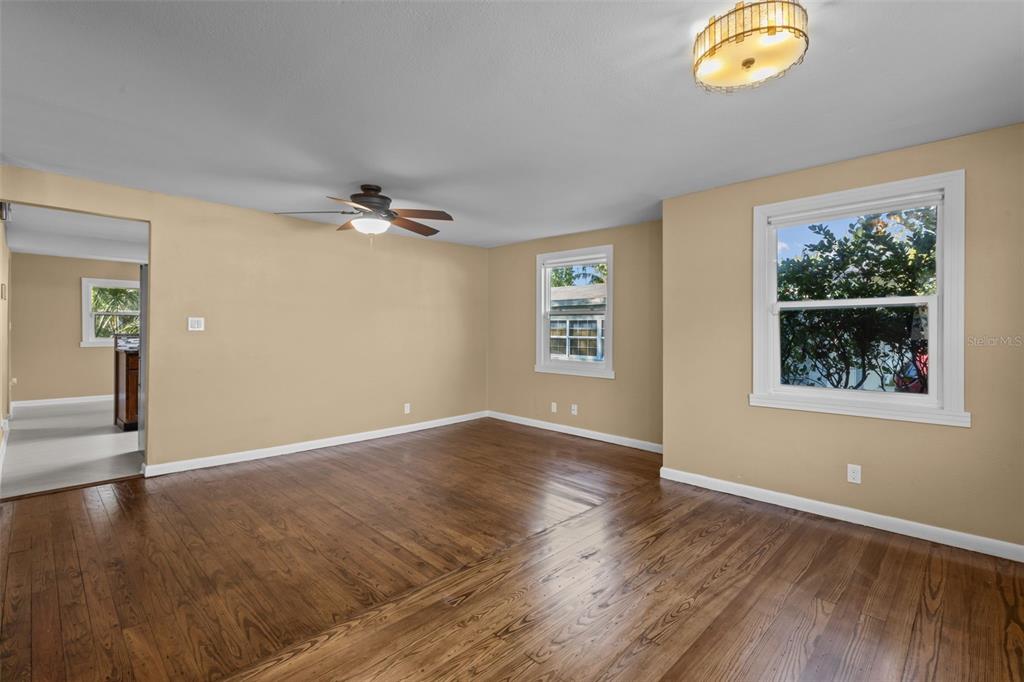 1908 West Fern Street Tampa, FL 33604 - Photo 7 of 47 an empty room with wooden floor and windows