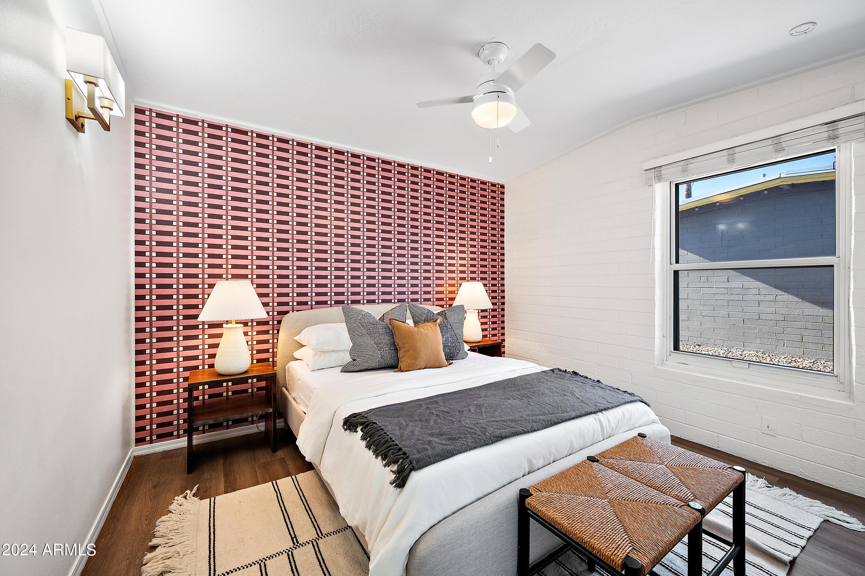 401 South Robert Road Tempe, AZ 85281 - Photo 17 of 35 a bedroom with a bed and a painting on the wall