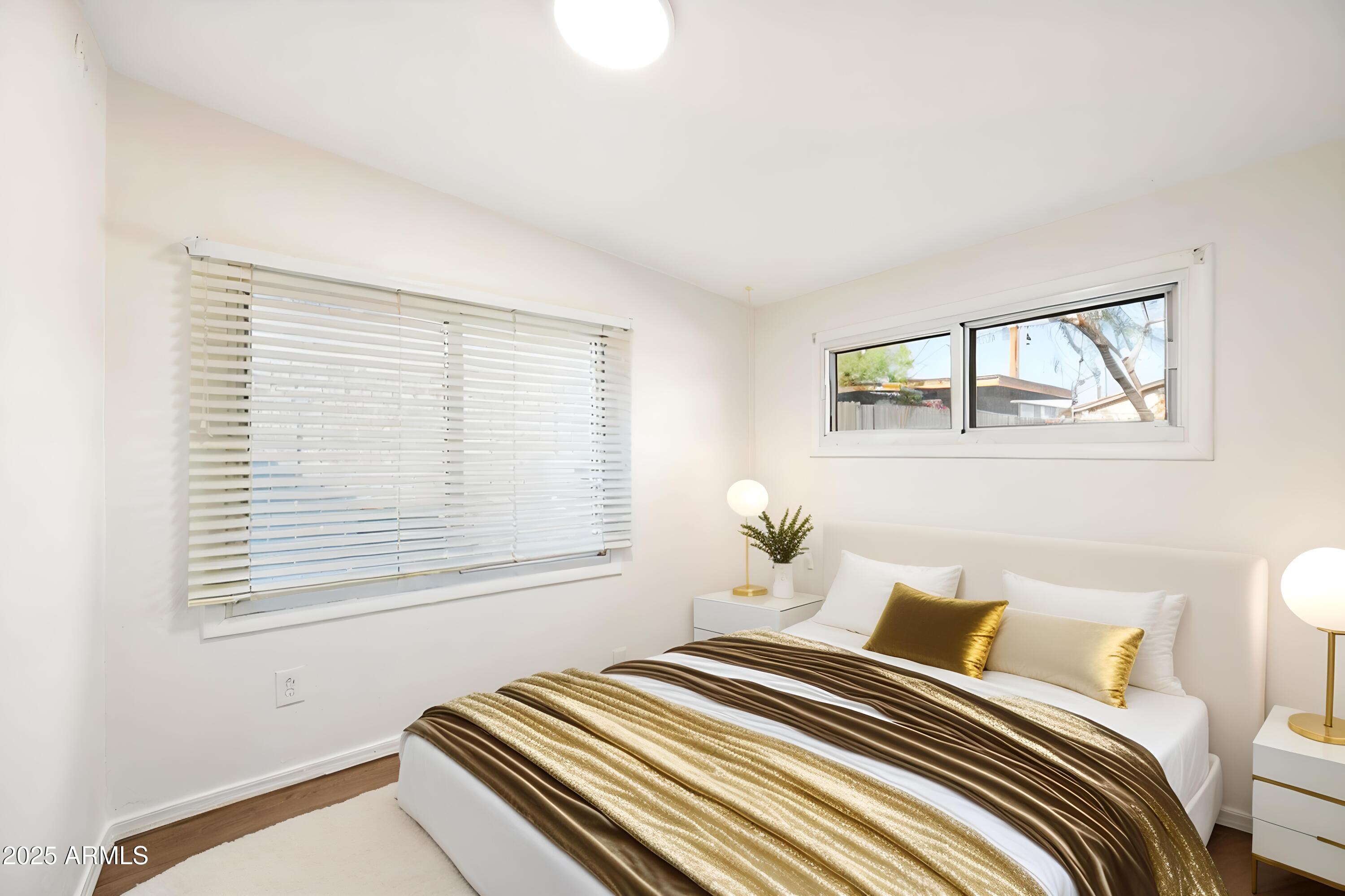 401 South Robert Road Tempe, AZ 85281 - Photo 25 of 35 a bedroom with bed and a window