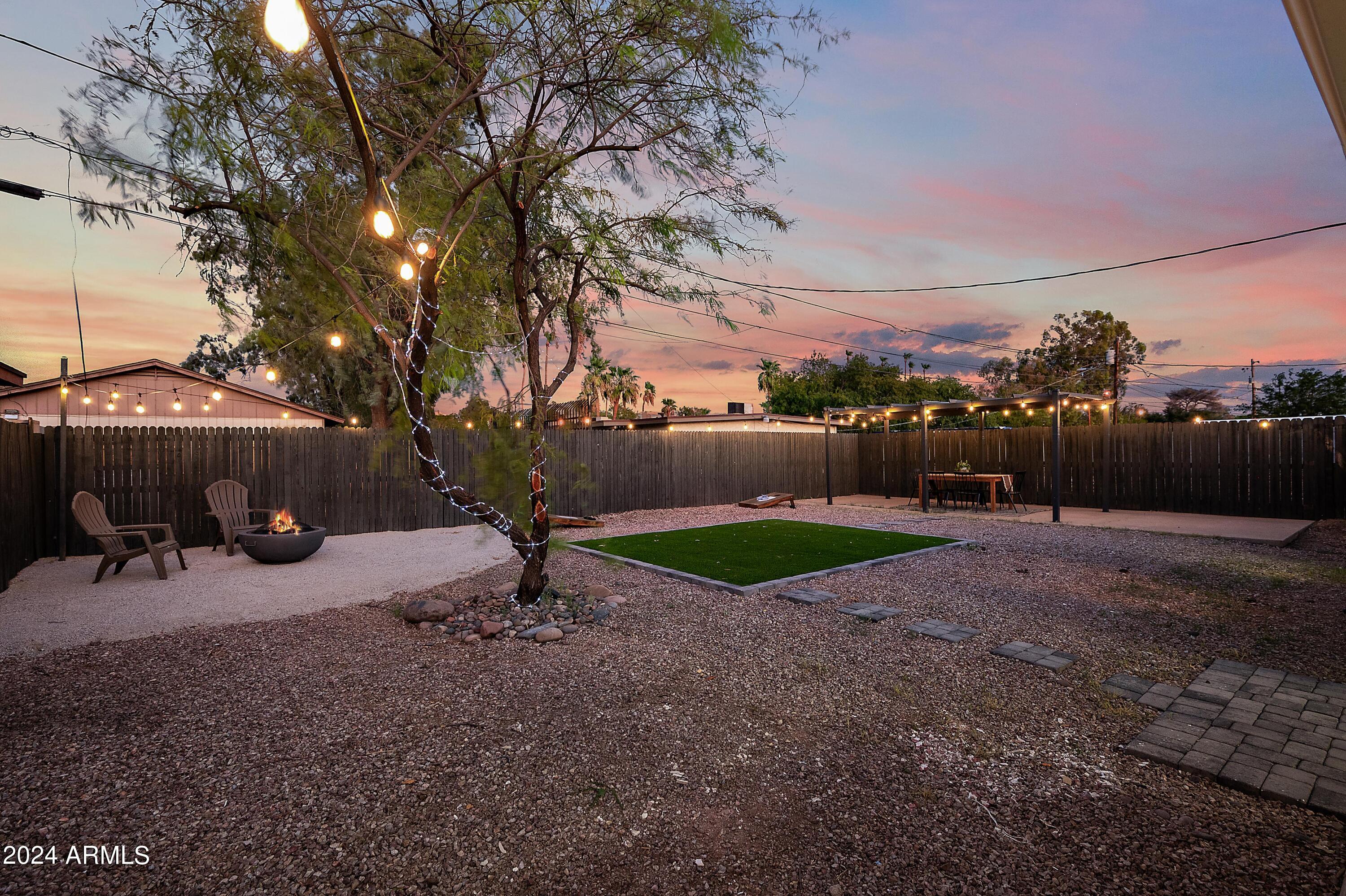 401 South Robert Road Tempe, AZ 85281 - Photo 30 of 35 a view of a backyard with a tree