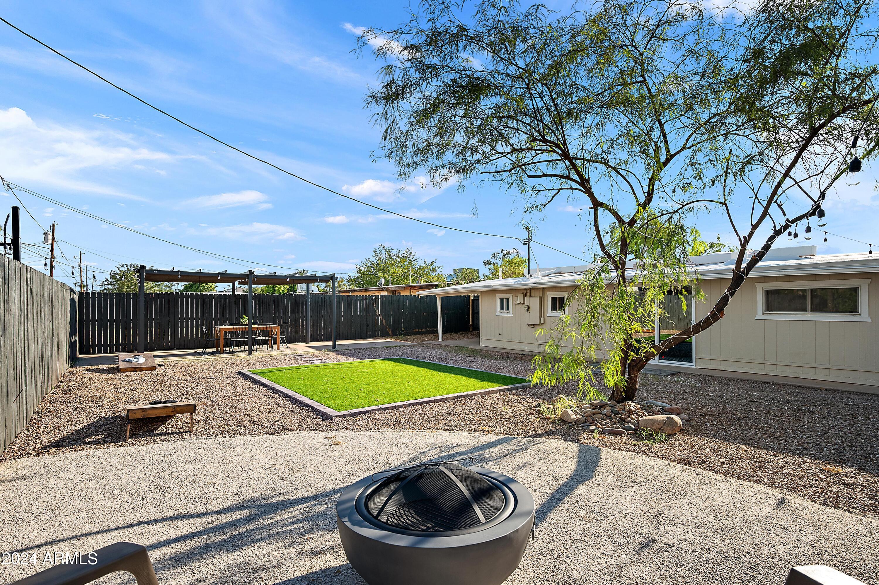 401 South Robert Road Tempe, AZ 85281 - Photo 31 of 35 a view of a backyard with a patio