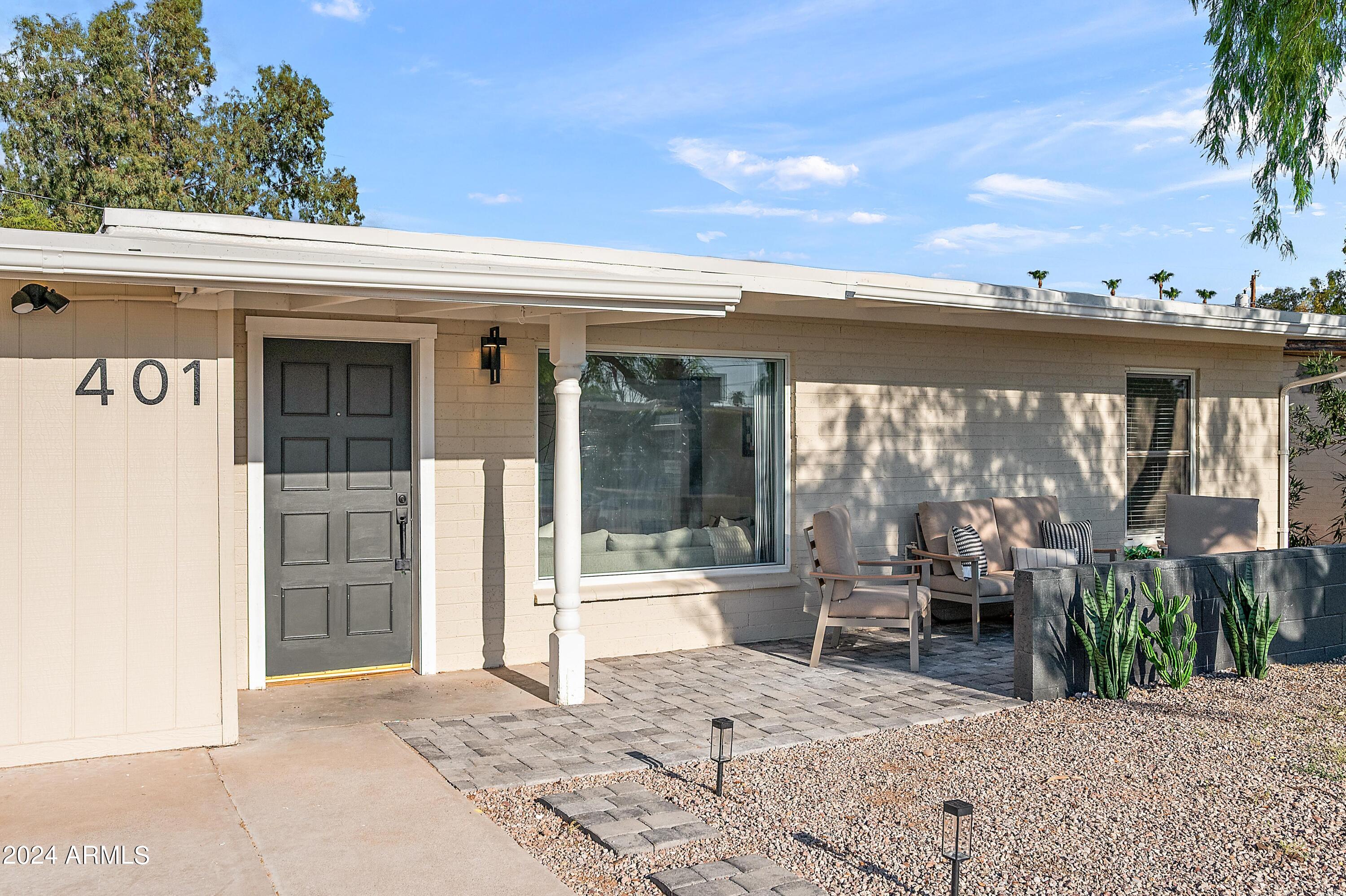 401 South Robert Road Tempe, AZ 85281 - Photo 34 of 35 a view of a balcony dining table and chairs