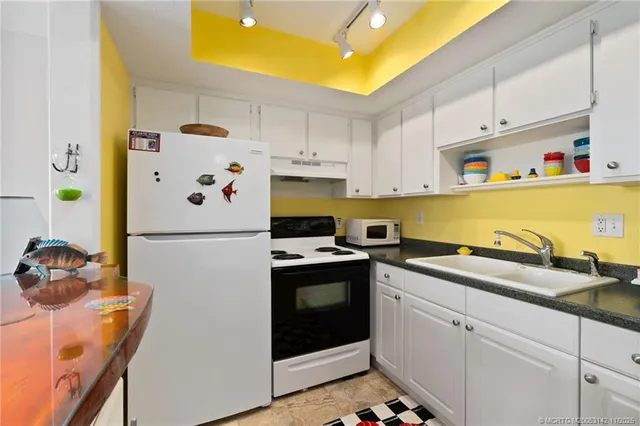 a view of a dining room kitchen and a window