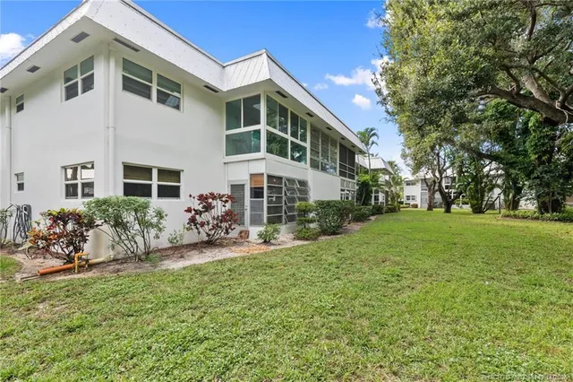 a view of a cars parked in front of a building