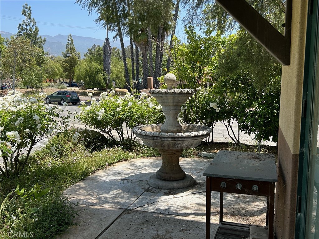 407 Bryant Circle, Unit A Ojai, CA 93023 - Photo 3 of 10 a view of a porch with furniture and a fire pit
