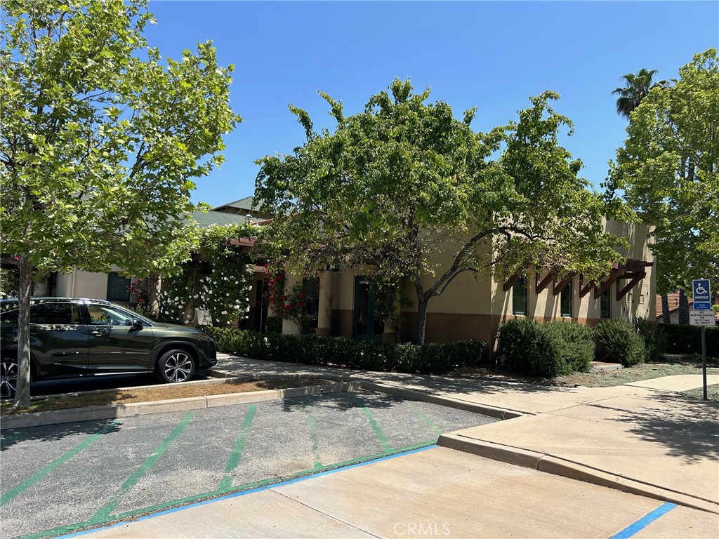 407 Bryant Circle, Unit A Ojai, CA 93023 - Photo 8 of 10 a view of a parked cars in front of a building