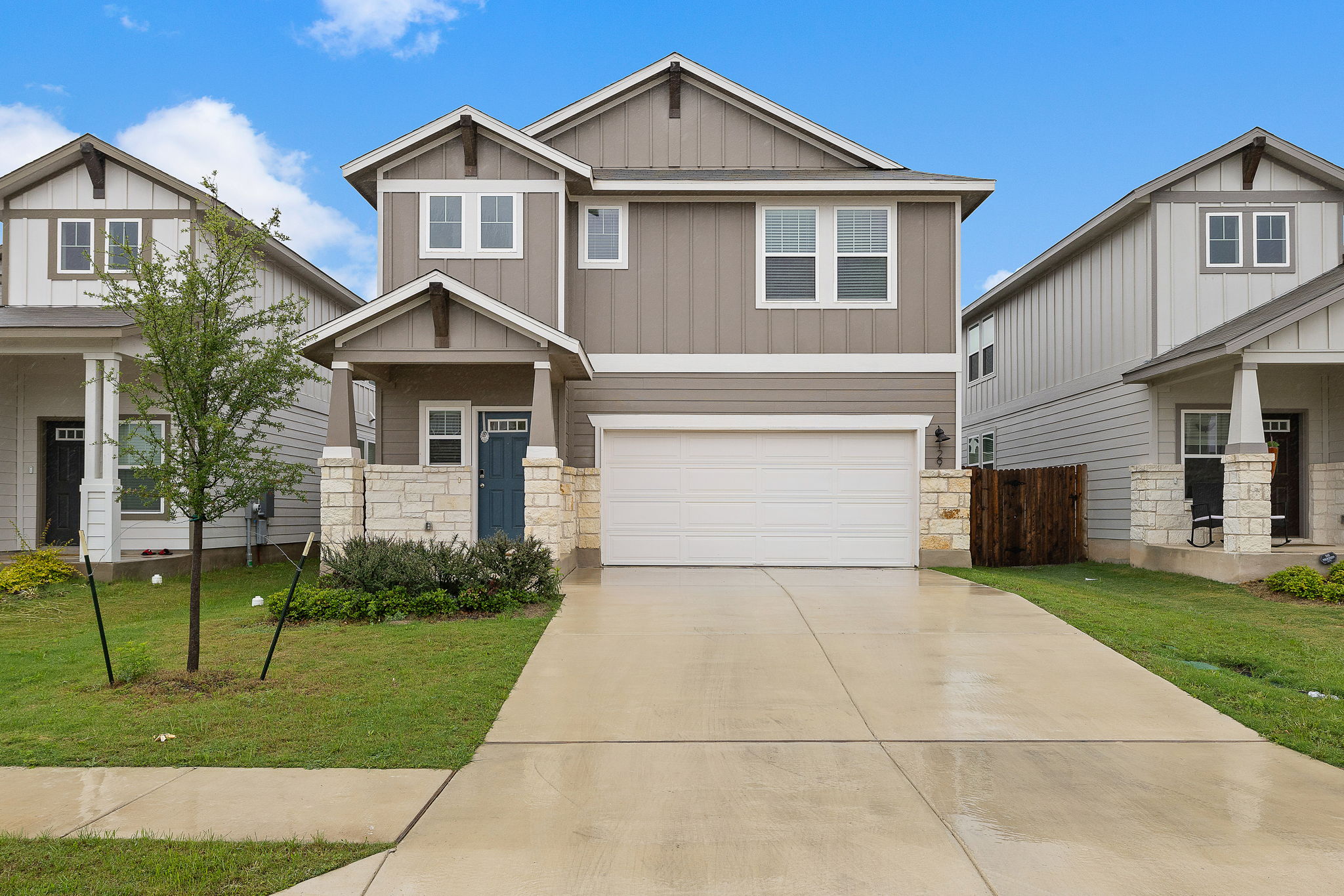 a front view of a house with a yard