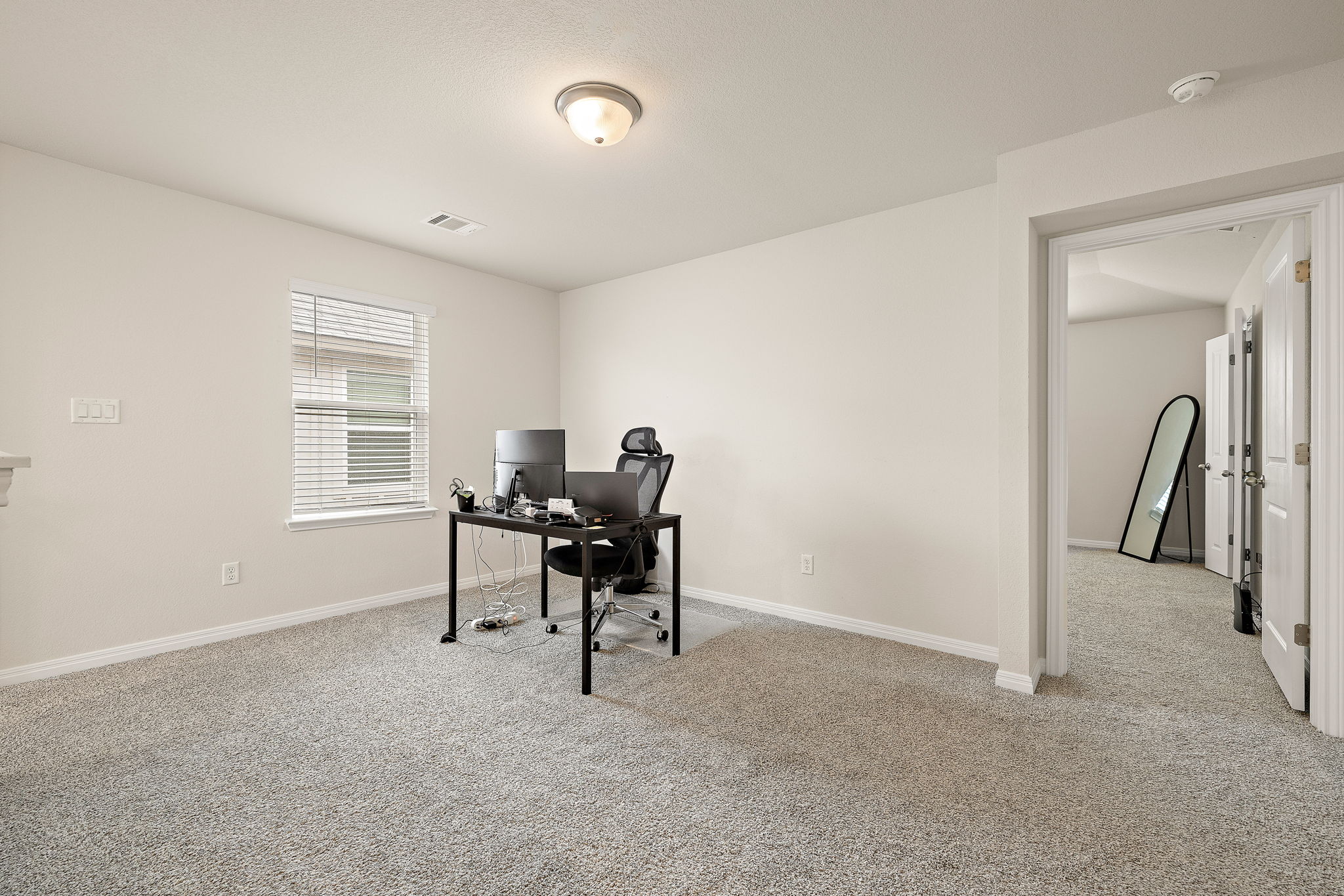 129 Greenway Drive Georgetown, TX 78628 - Photo 11 of 22 a work room with furniture and a window