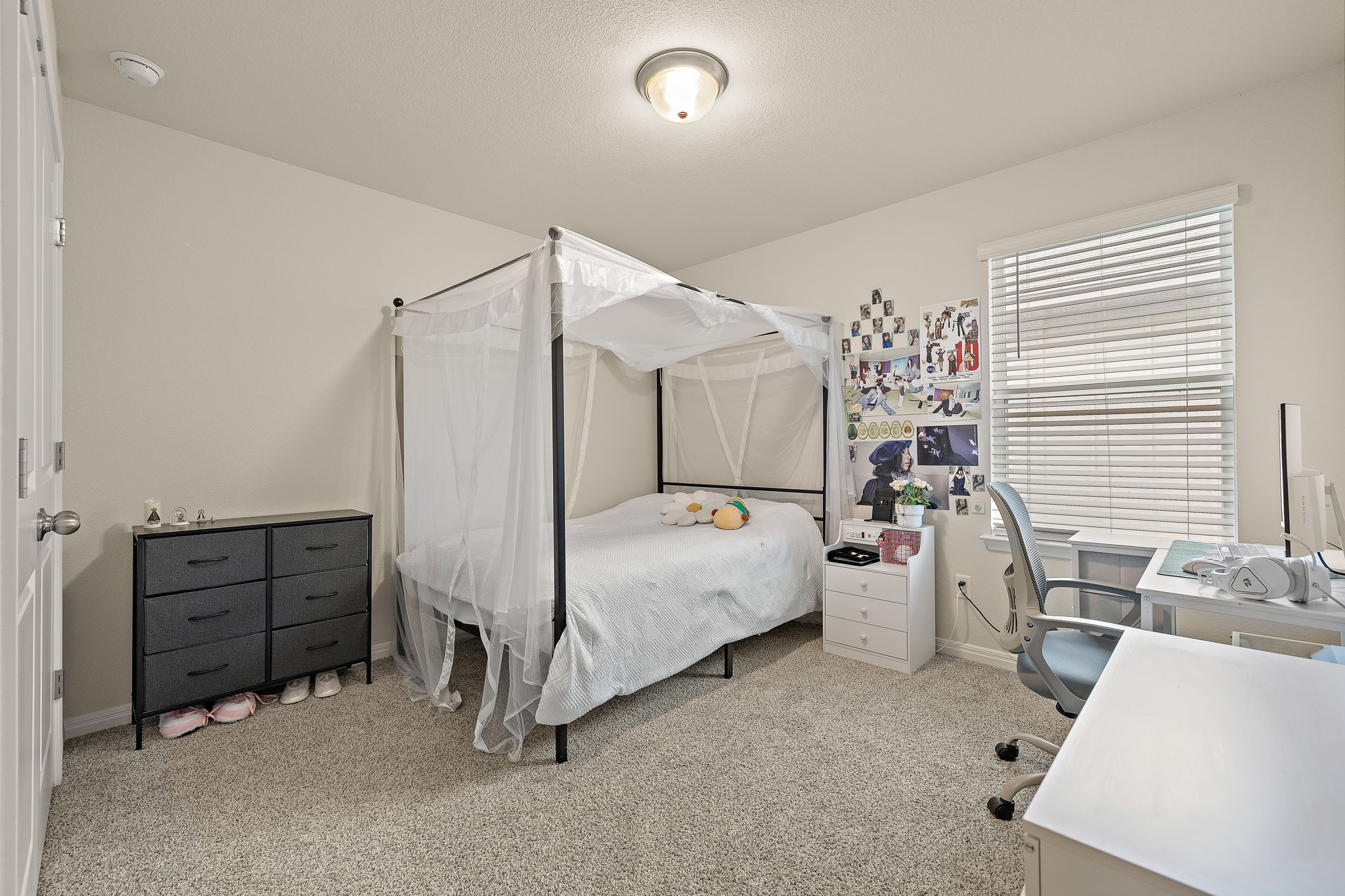 129 Greenway Drive Georgetown, TX 78628 - Photo 16 of 22 a bed room with furniture and a window