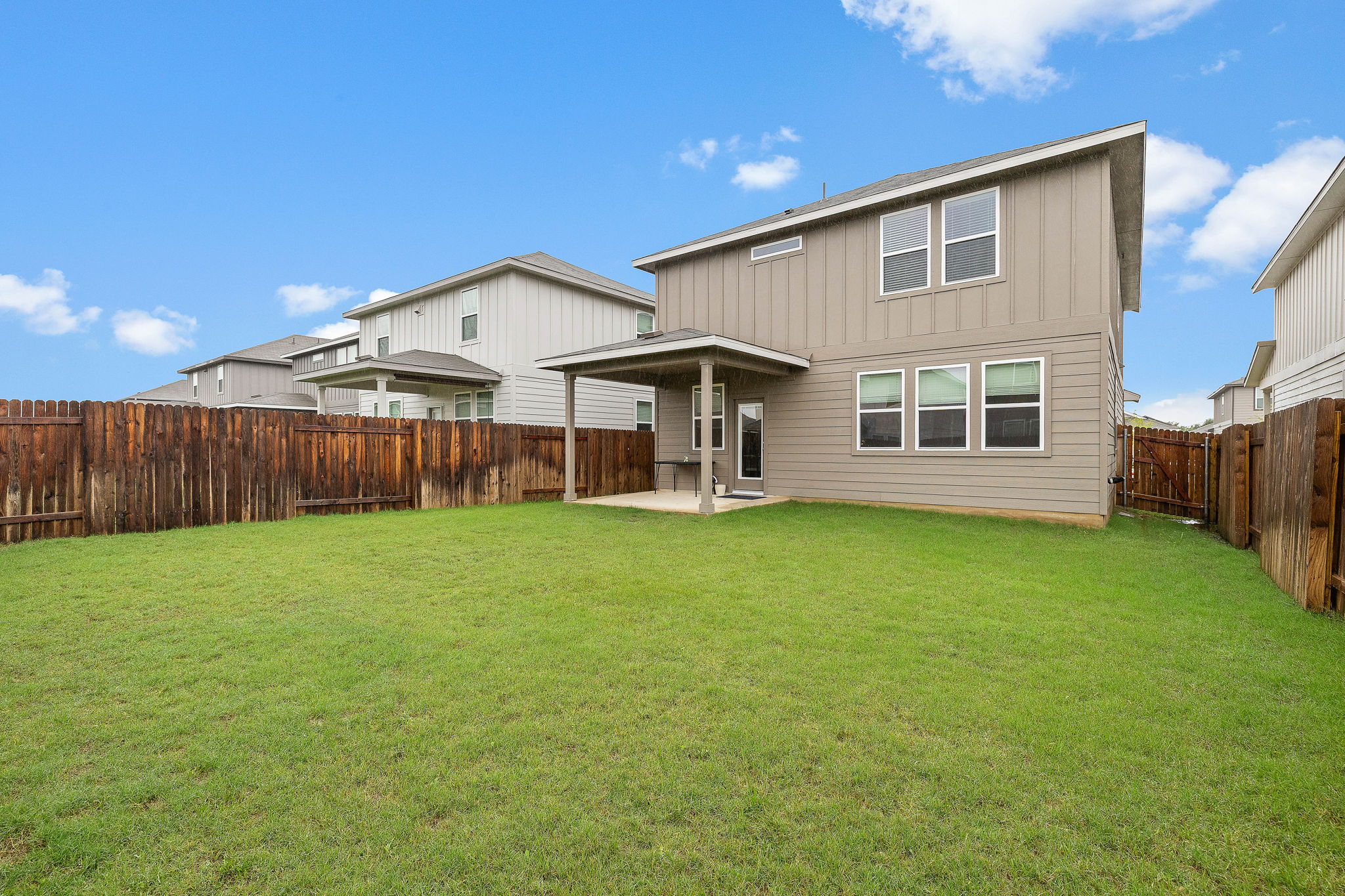 129 Greenway Drive Georgetown, TX 78628 - Photo 20 of 22 a front view of a house with garden